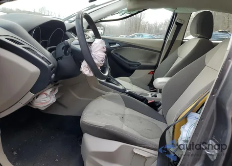 2014 Ford Focus Se z USA, uszkodzony, nr VIN 1FADP3F2XEL231927